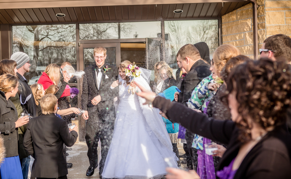 The guests threw fake snow as they exited the church. However, this substance was very itchy as it entered the couple's clothes, not so fun!