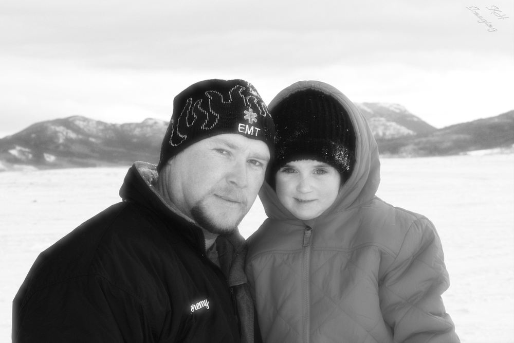 This image isn't that bad. The editing is wrong (for my current style anyway) but it is cute, a father daughter moment. Walden, CO Dec. 2008